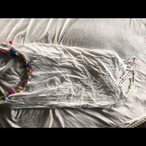 White dress colorful Pom poms at end